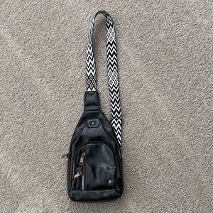 Black Woman’s Crossbody Sling Bag with Patterned Strap